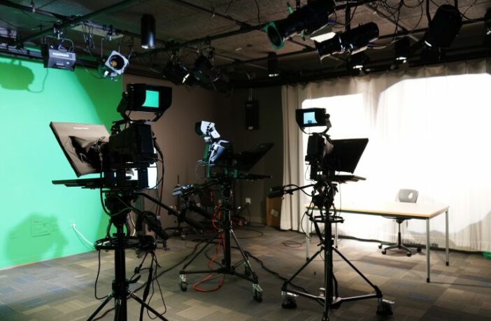 studio with AV video equipment and green screen