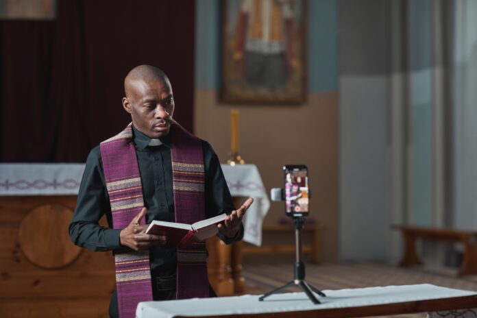 priest-performing-online-in-the-church-2025-03-05-09-50-19-utc (1)