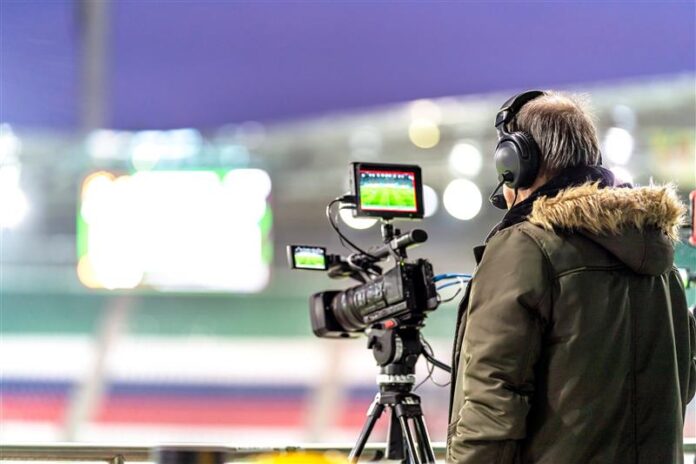 cameraman-with-a-professional-video-camera-on-the-2026-01-07-00-32-50-utc